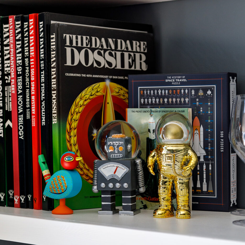 Modular's Founder Adam Millington has a collection of Dan Dare books shown here on a shelf. 