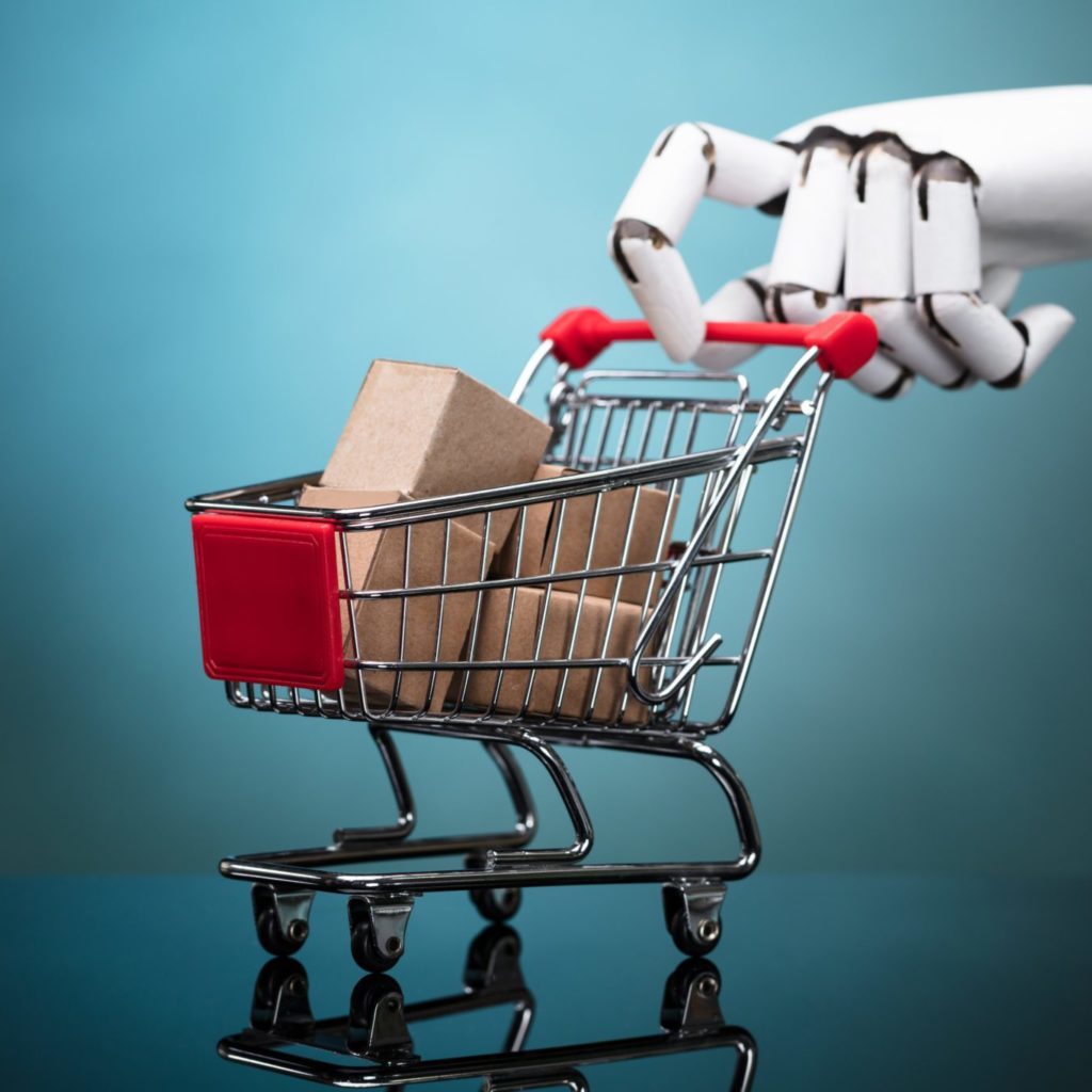 Robot Holding Shopping Cart With Cardboard Boxes On Turquoise Background